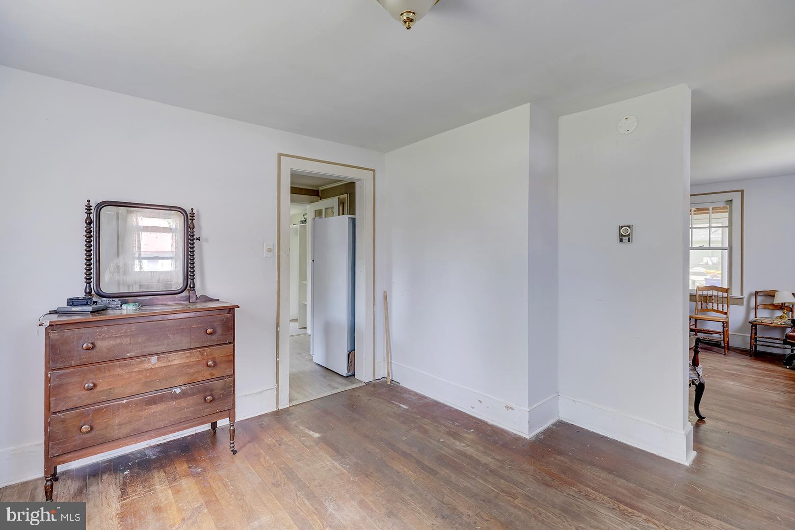 29092 Piney Neck Road Dagsboro, DE 19939 - Photo 10 of 49 a view of room with wooden floor