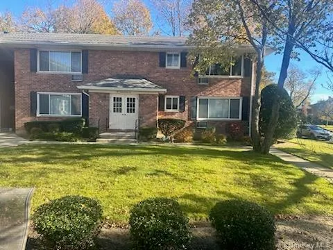 a front view of a house with swimming pool