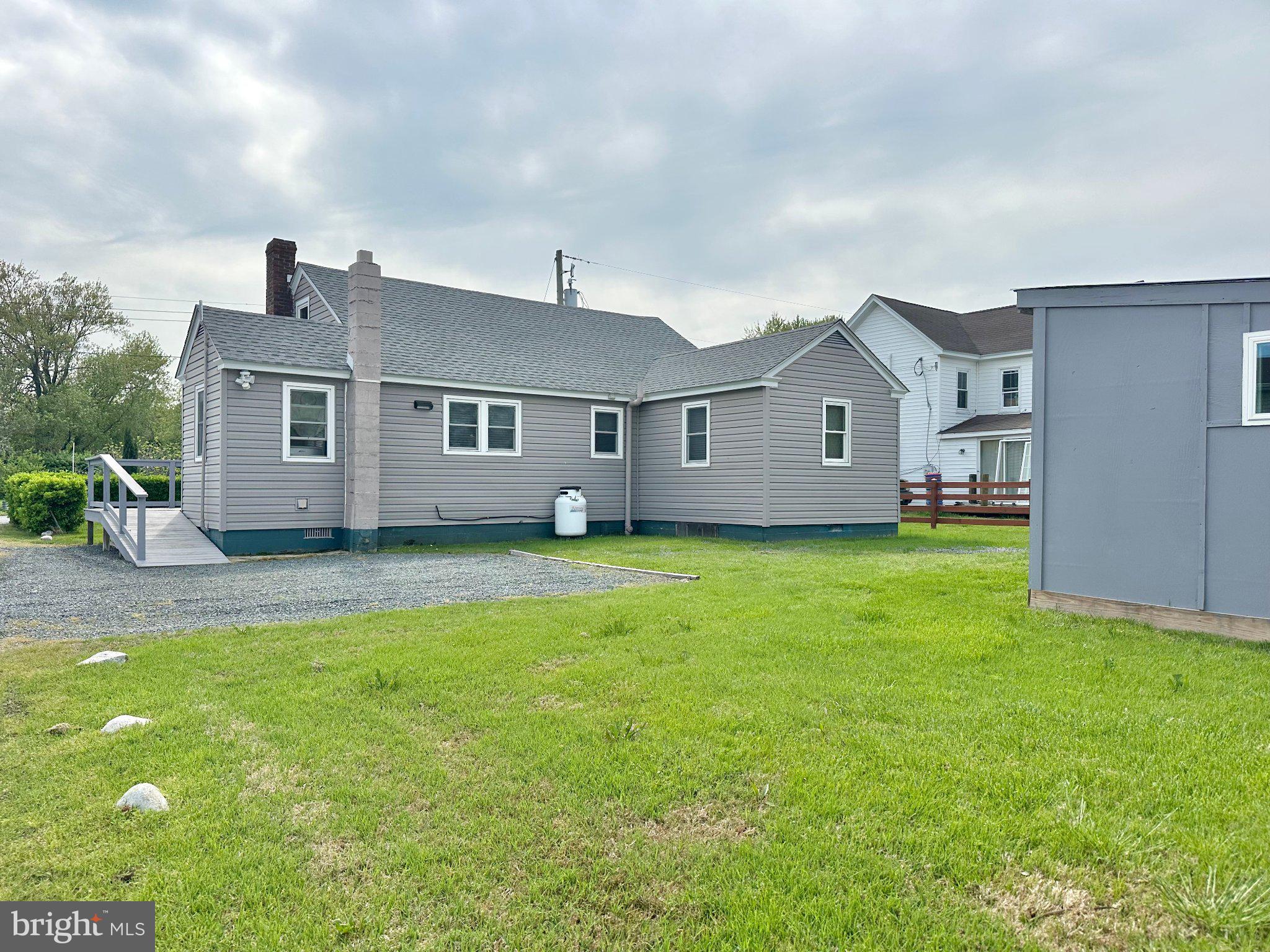 21530 Coopertown Road Tilghman, MD 21671 - Photo 3 of 23 Charming home with spacious yard.