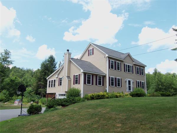 10 Adams Road Townsend, MA 01469 - Photo 1 of 30 a front view of a house with a yard