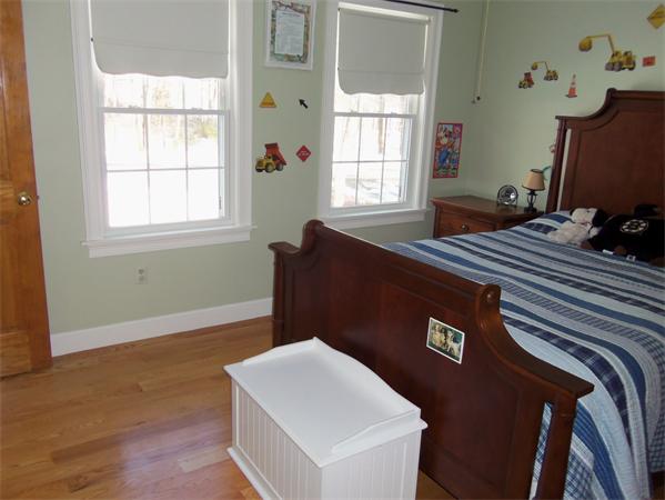 10 Adams Road Townsend, MA 01469 - Photo 19 of 30 a bedroom with a bed and a window