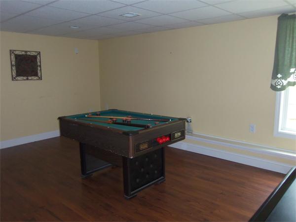 10 Adams Road Townsend, MA 01469 - Photo 25 of 30 a room with a table and a window