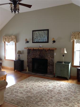 10 Adams Road Townsend, MA 01469 - Photo 27 of 30 a living room with furniture and a fireplace