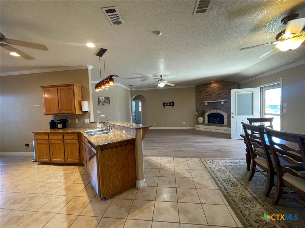 170 County Road 4709 Kempner, TX 76539 - Photo 6 of 24 Kitchen with Breakfast Bar, Pendant Lighting and Dining Area open to the Living Room
Texas Real Estate Sales, Leah Caruthers