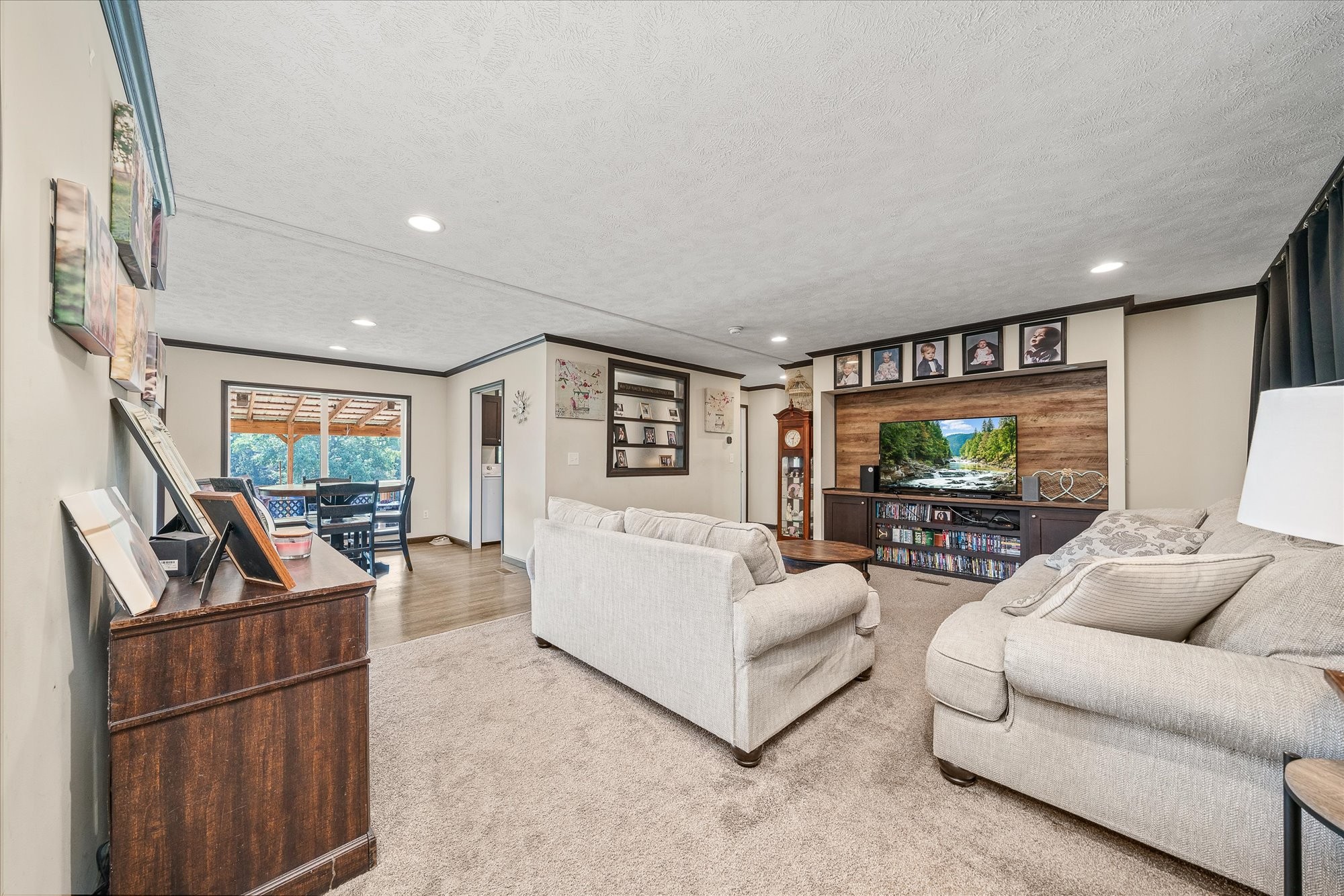 330 Griffintown Road Sparta, TN 38583 - Photo 12 of 43 a living room with furniture and a flat screen tv