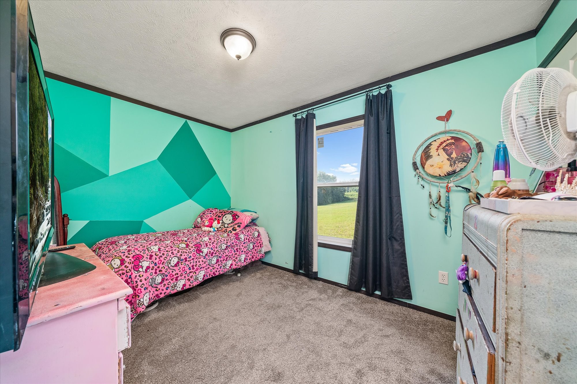 330 Griffintown Road Sparta, TN 38583 - Photo 21 of 43 a bedroom with a bed and a window