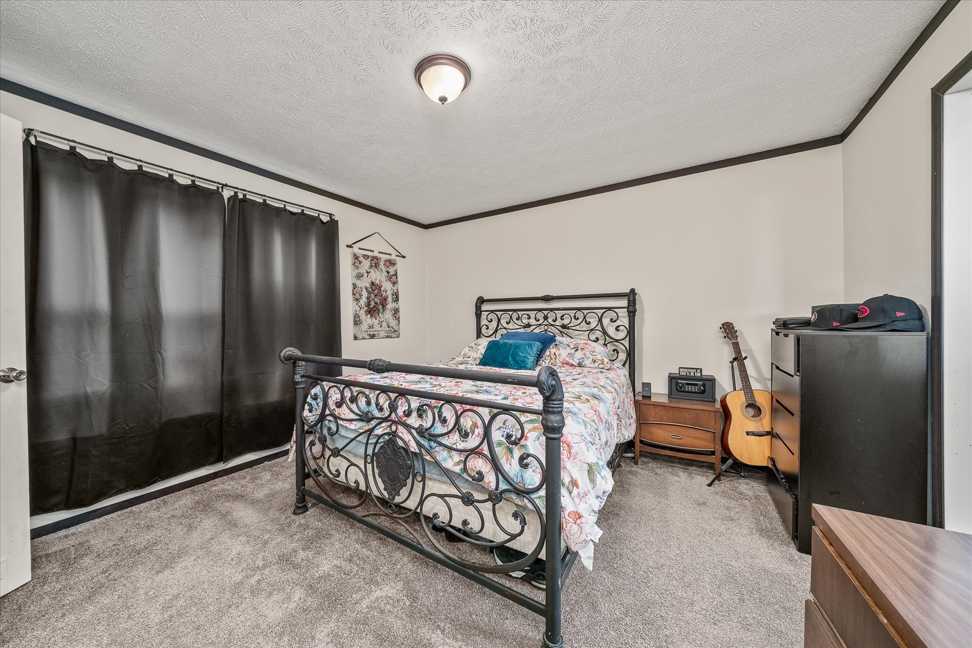 330 Griffintown Road Sparta, TN 38583 - Photo 24 of 43 a bedroom with furniture and a window