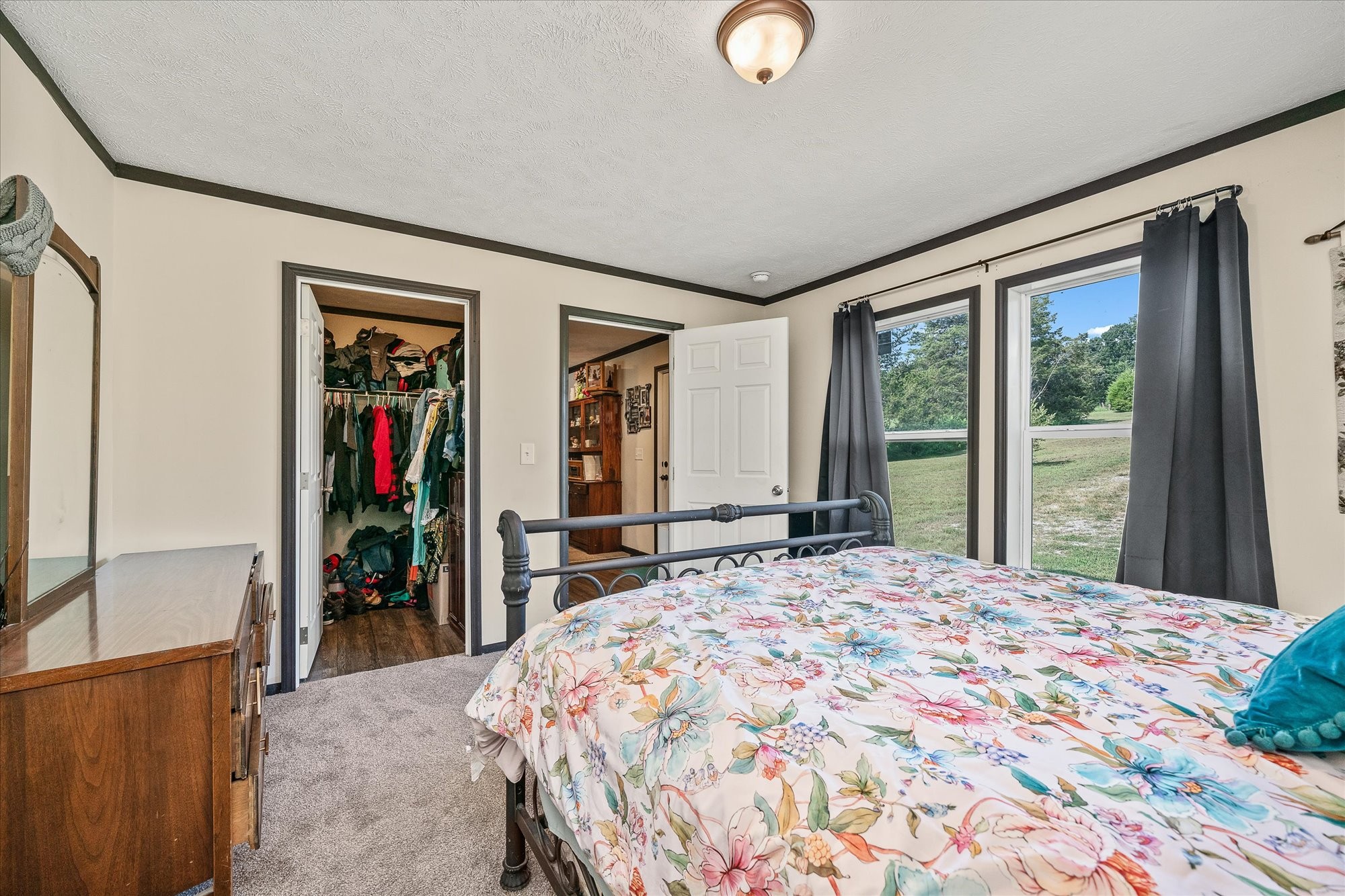 330 Griffintown Road Sparta, TN 38583 - Photo 27 of 43 a bed sitting in a bedroom next to a window