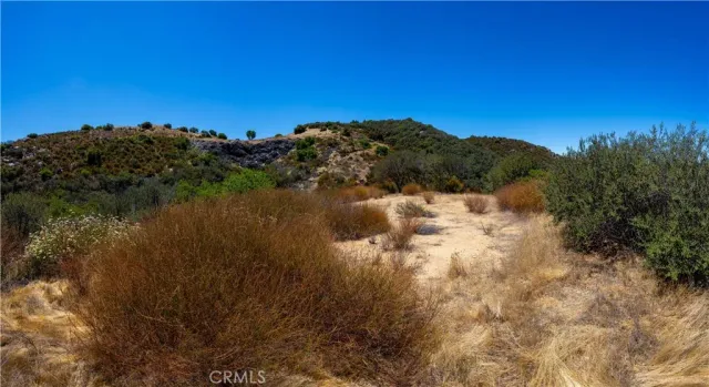 a view of a lake with a mountain in the background