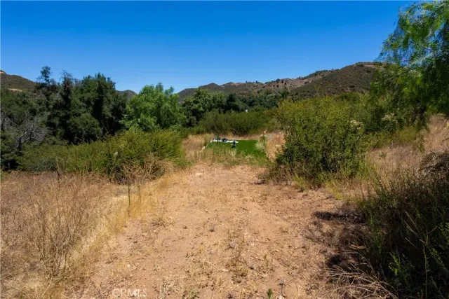 a view of a lake with mountains in the background