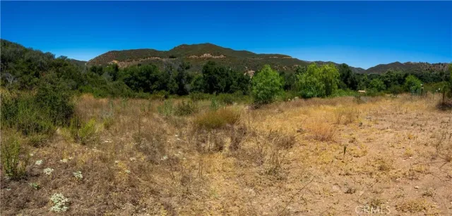 a view of lake with mountain