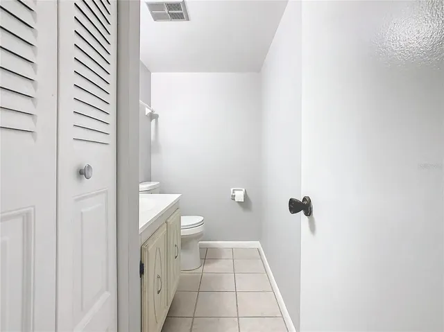 a bathroom with a sink and toilet