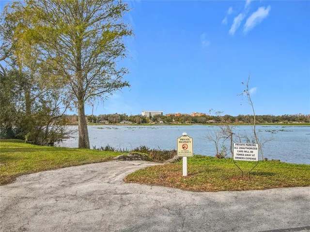 a view of a lake with a big yard