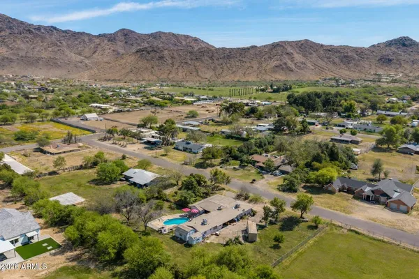 an aerial view of residential house with outdoor space