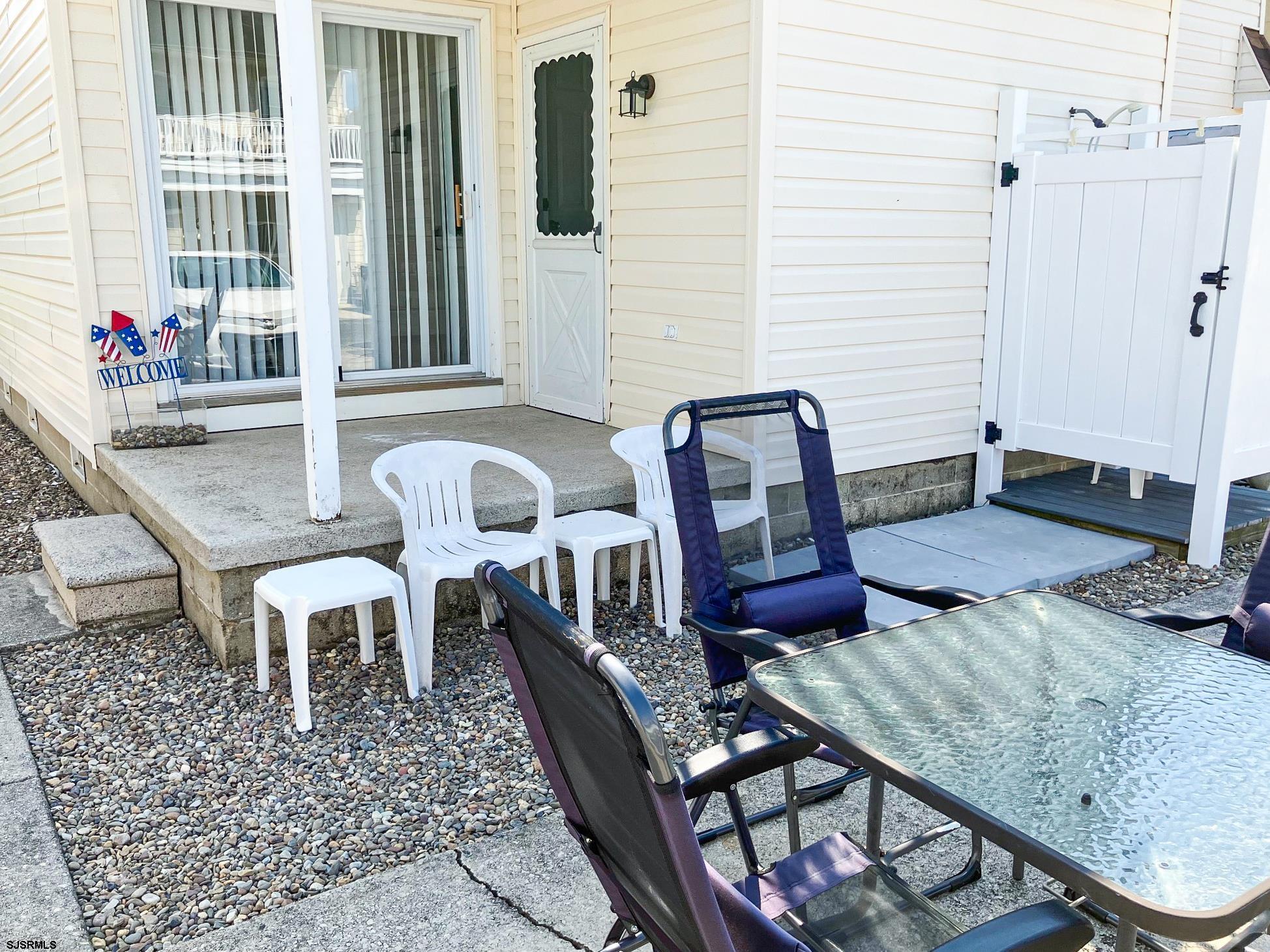335 42nd Street South, Unit FIRST Brigantine, NJ 08203 - Photo 17 of 23 a living room with furniture and wooden floor