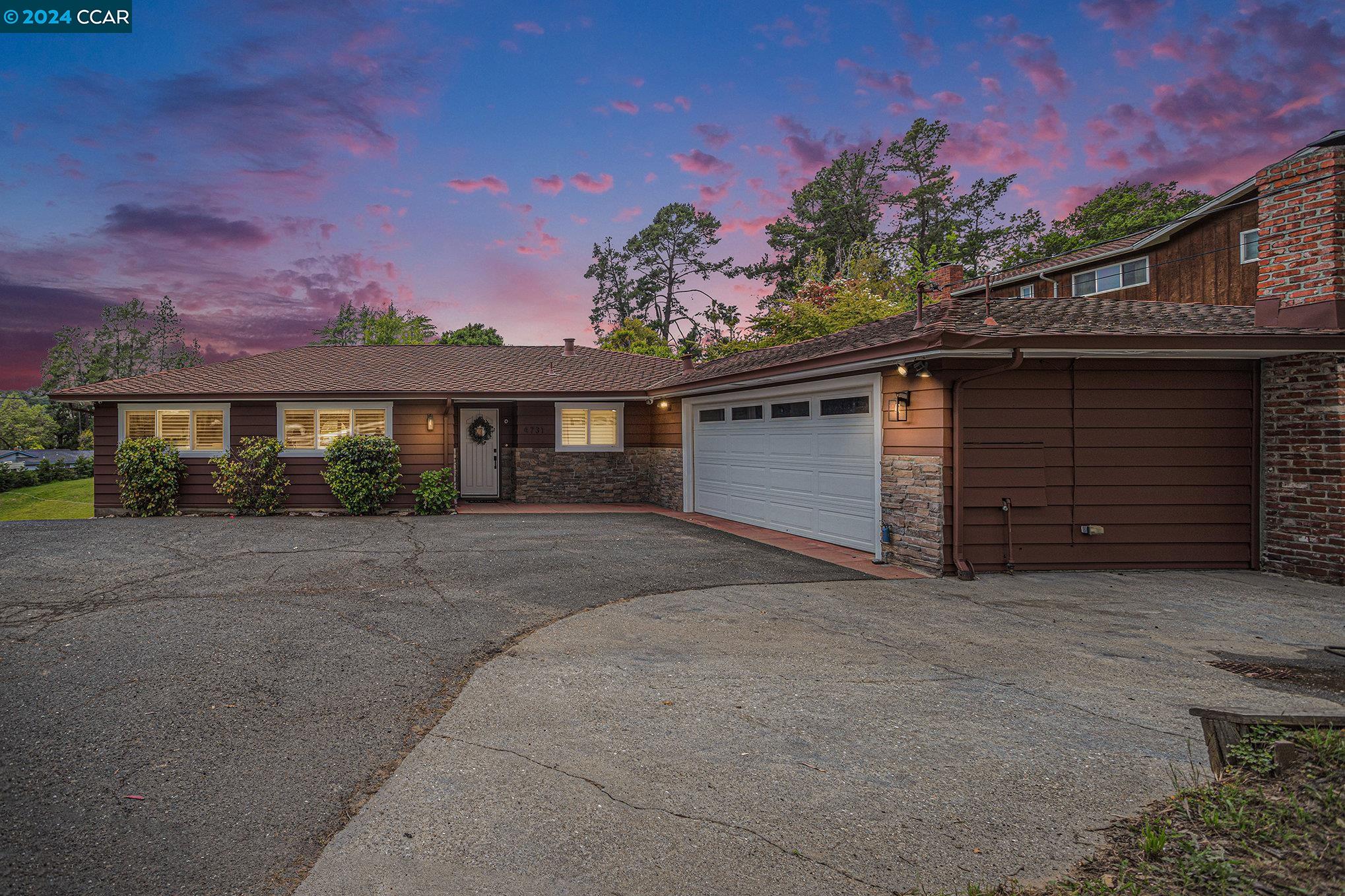 4731 Grass Valley Road Oakland, CA 94605 - Photo 1 of 1 front view of a house with a garage