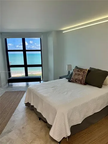 a view of a lake in front of a building