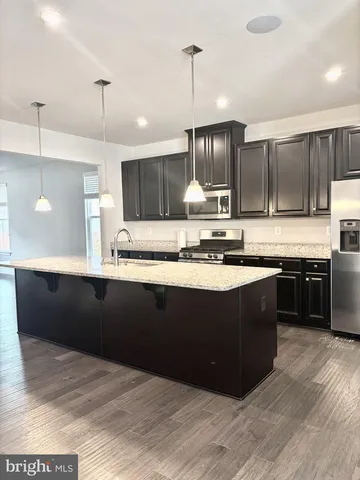 a room with a fireplace and a window