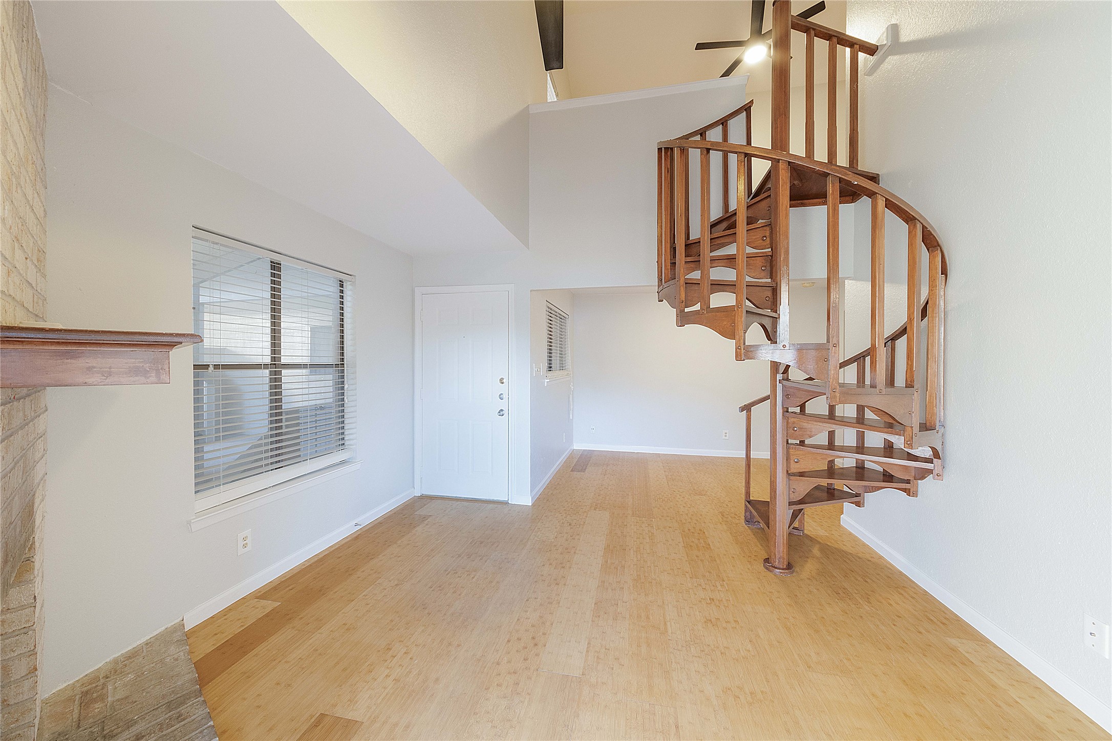 2500 Burleson Road, Unit 512 Austin, TX 78741 - Photo 6 of 16 a view of an entryway with wooden floor