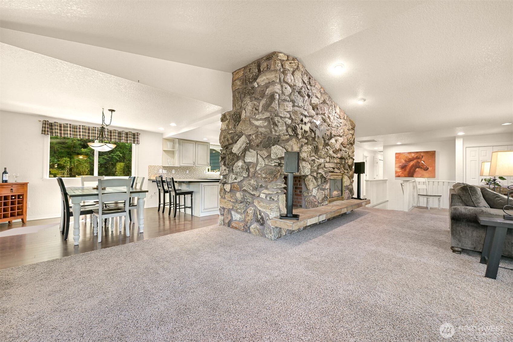 1300 West Axton Road Ferndale, WA 98248 - Photo 11 of 40 a living room with furniture and a chandelier