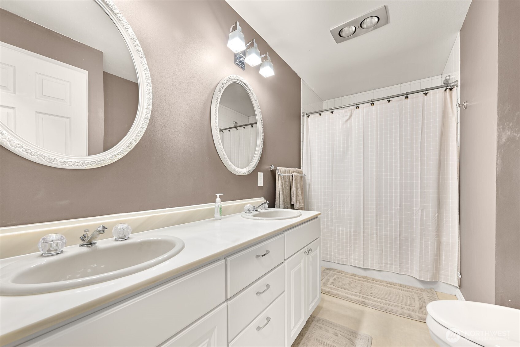 1300 West Axton Road Ferndale, WA 98248 - Photo 29 of 40 a bathroom with a double vanity sink mirror and toilet