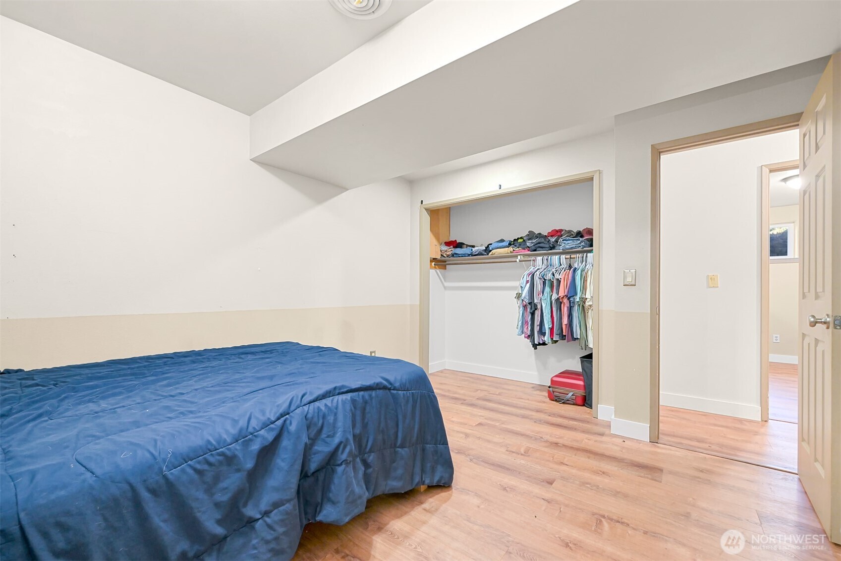 1300 West Axton Road Ferndale, WA 98248 - Photo 31 of 40 a bedroom with a bed and wooden floor