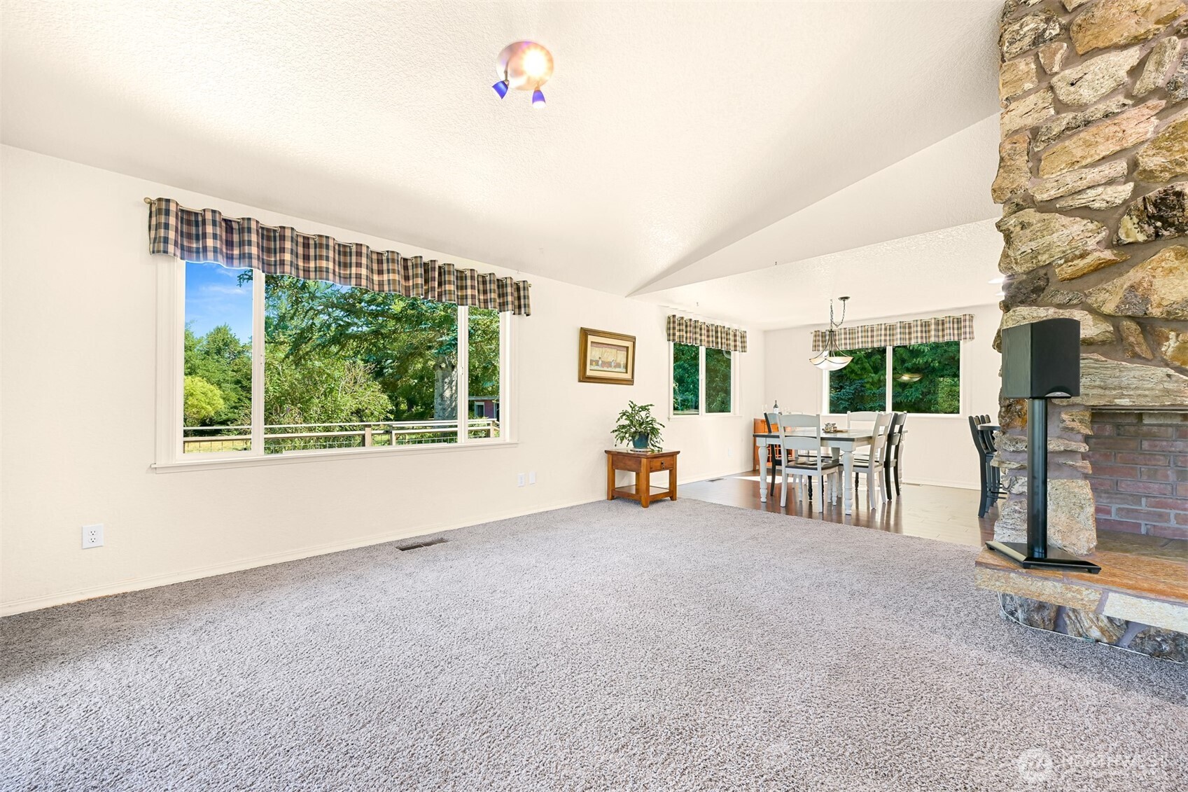 1300 West Axton Road Ferndale, WA 98248 - Photo 33 of 40 a view of a livingroom with furniture and a flat screen tv