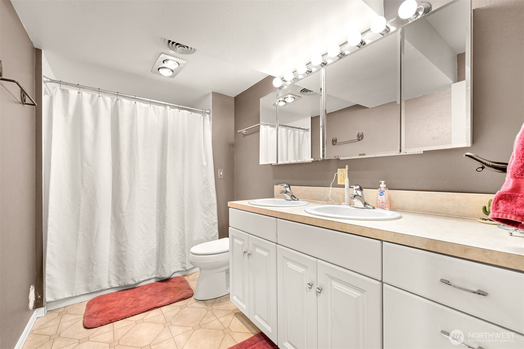 1300 West Axton Road Ferndale, WA 98248 - Photo 34 of 40 a bathroom with a sink toilet and vanity