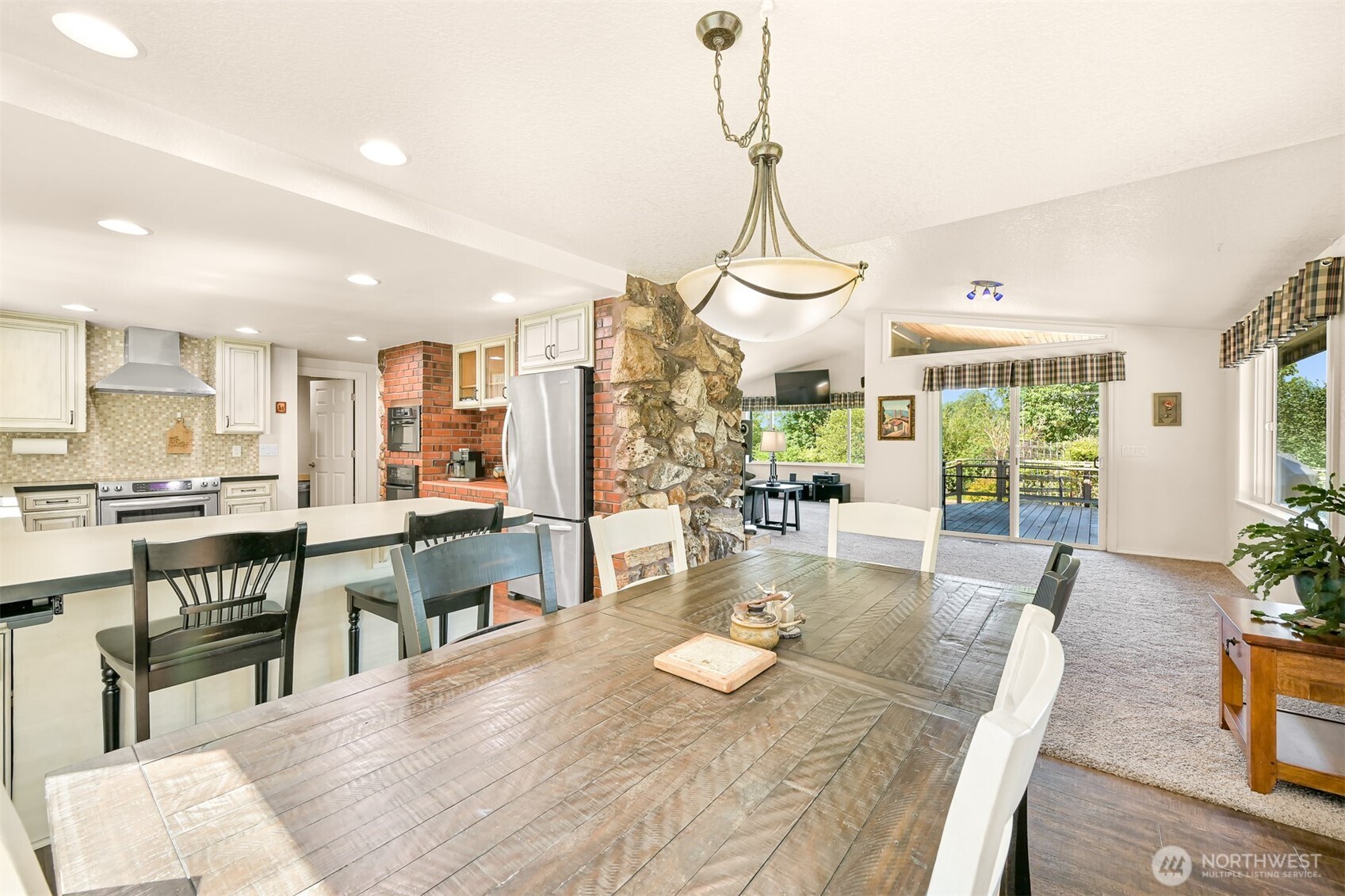 1300 West Axton Road Ferndale, WA 98248 - Photo 5 of 40 a view of a dining room and livingroom view