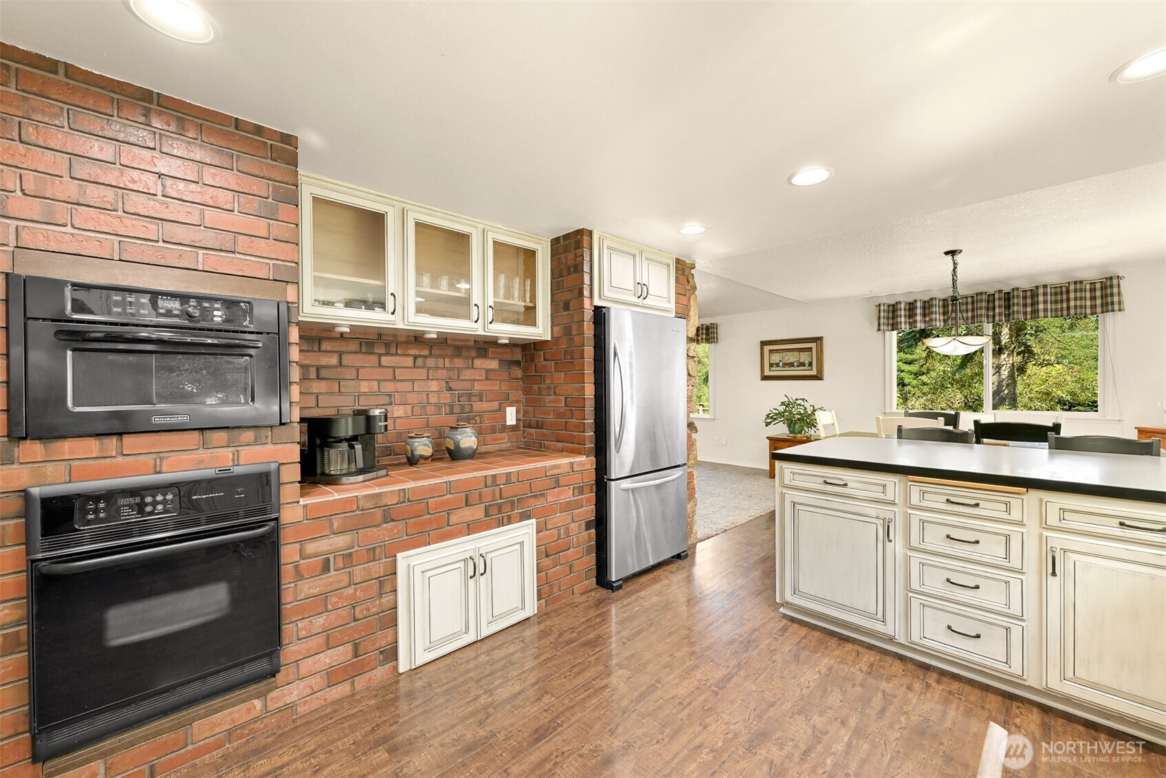 1300 West Axton Road Ferndale, WA 98248 - Photo 8 of 40 a kitchen with stainless steel appliances granite countertop a stove and a refrigerator