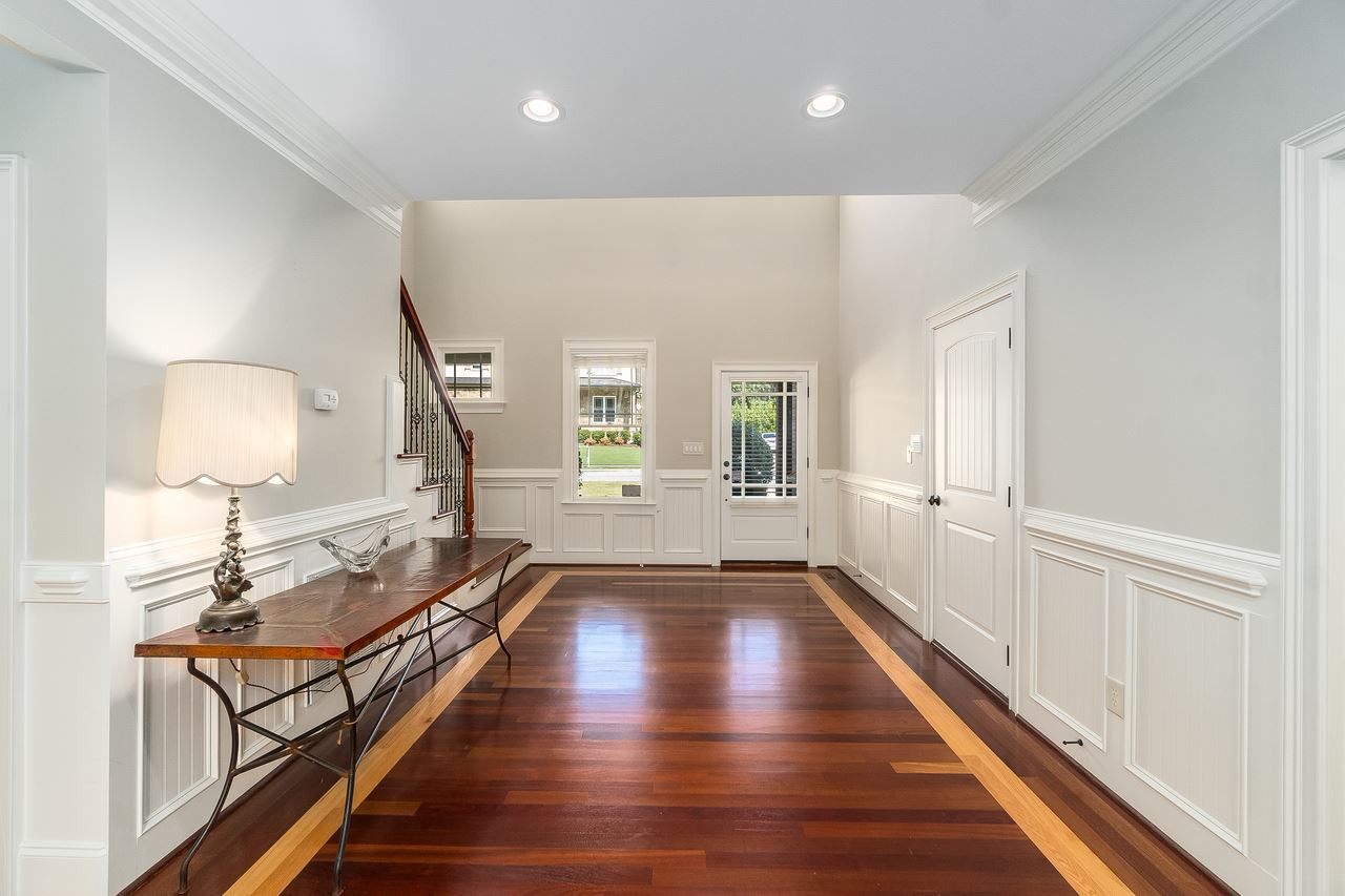 2310 Finley Ridge Lane Raleigh, NC 27615 - Photo 5 of 29 Large entrance with gorgeous Brazilian Cherry hardwood floors. Foyer