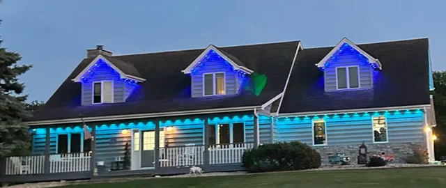 a front view of houses with yard