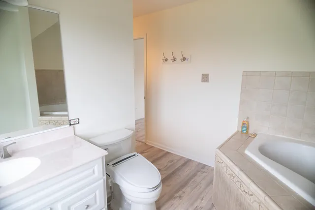 a bathroom with a sink and toilet
