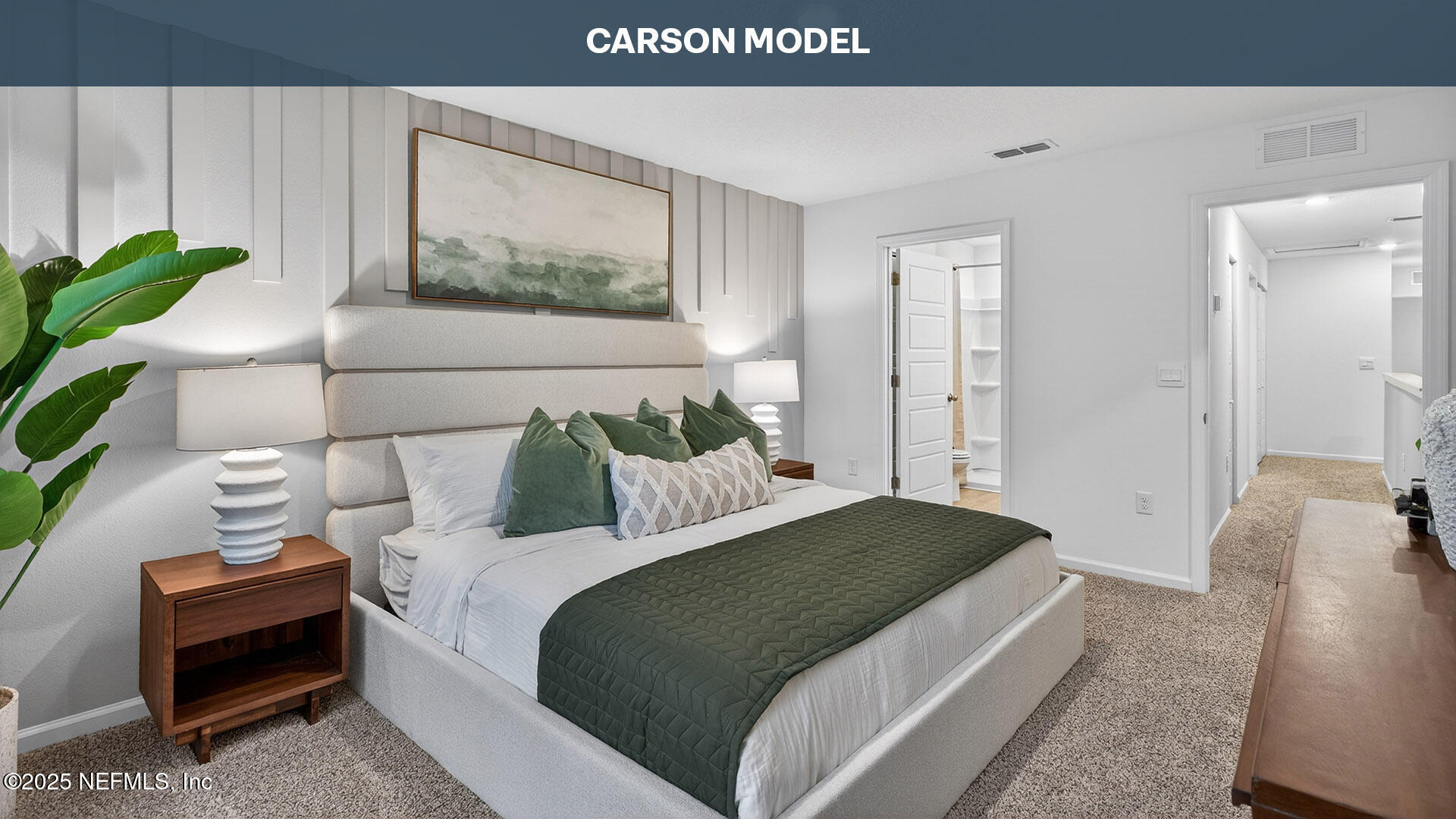 12742 Geronimo Place Jacksonville, FL 32218 - Photo 15 of 38 a bedroom with a bed a couch and potted plant