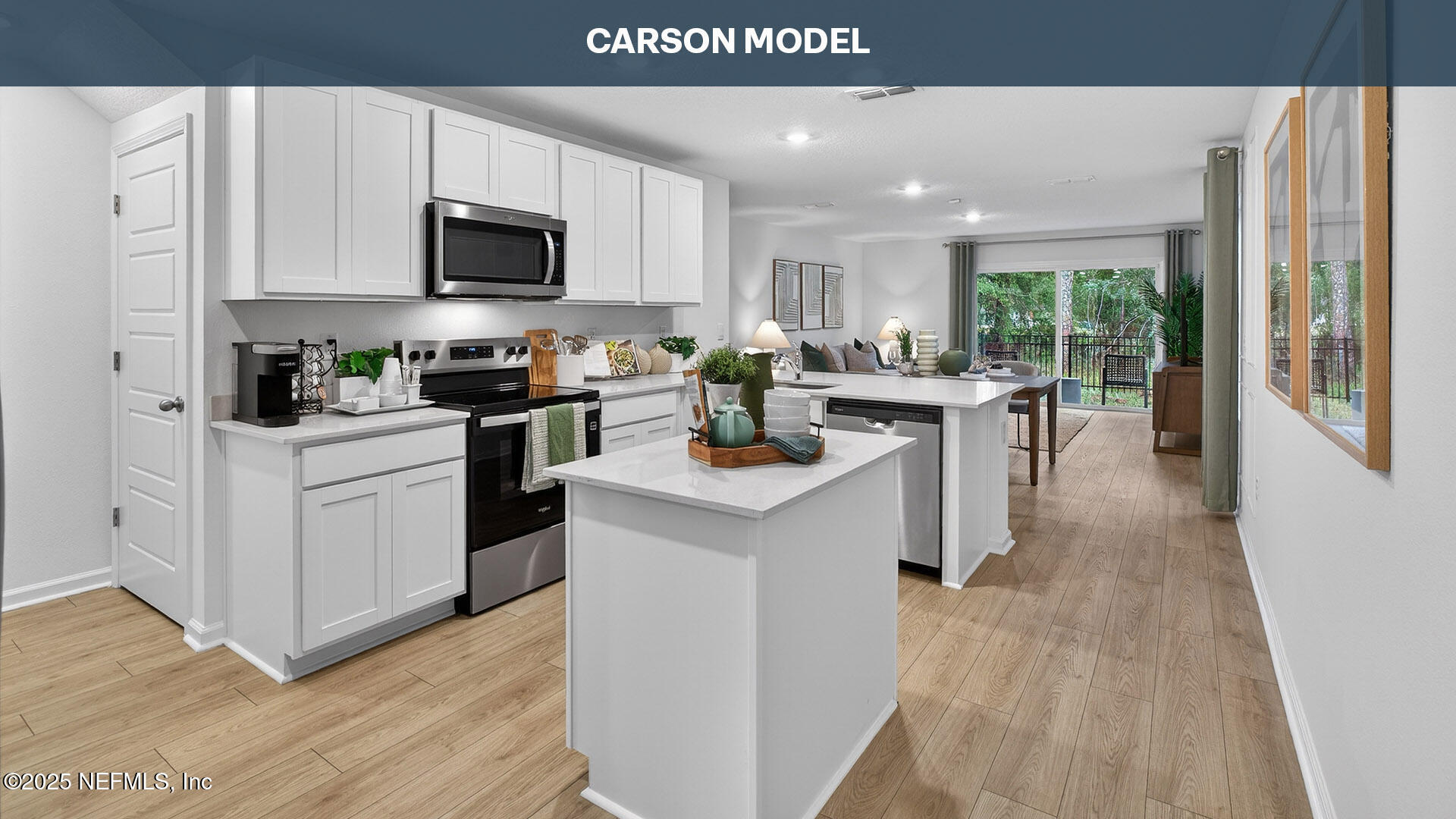 12742 Geronimo Place Jacksonville, FL 32218 - Photo 5 of 38 a kitchen with a sink a counter top space stainless steel appliances and cabinets