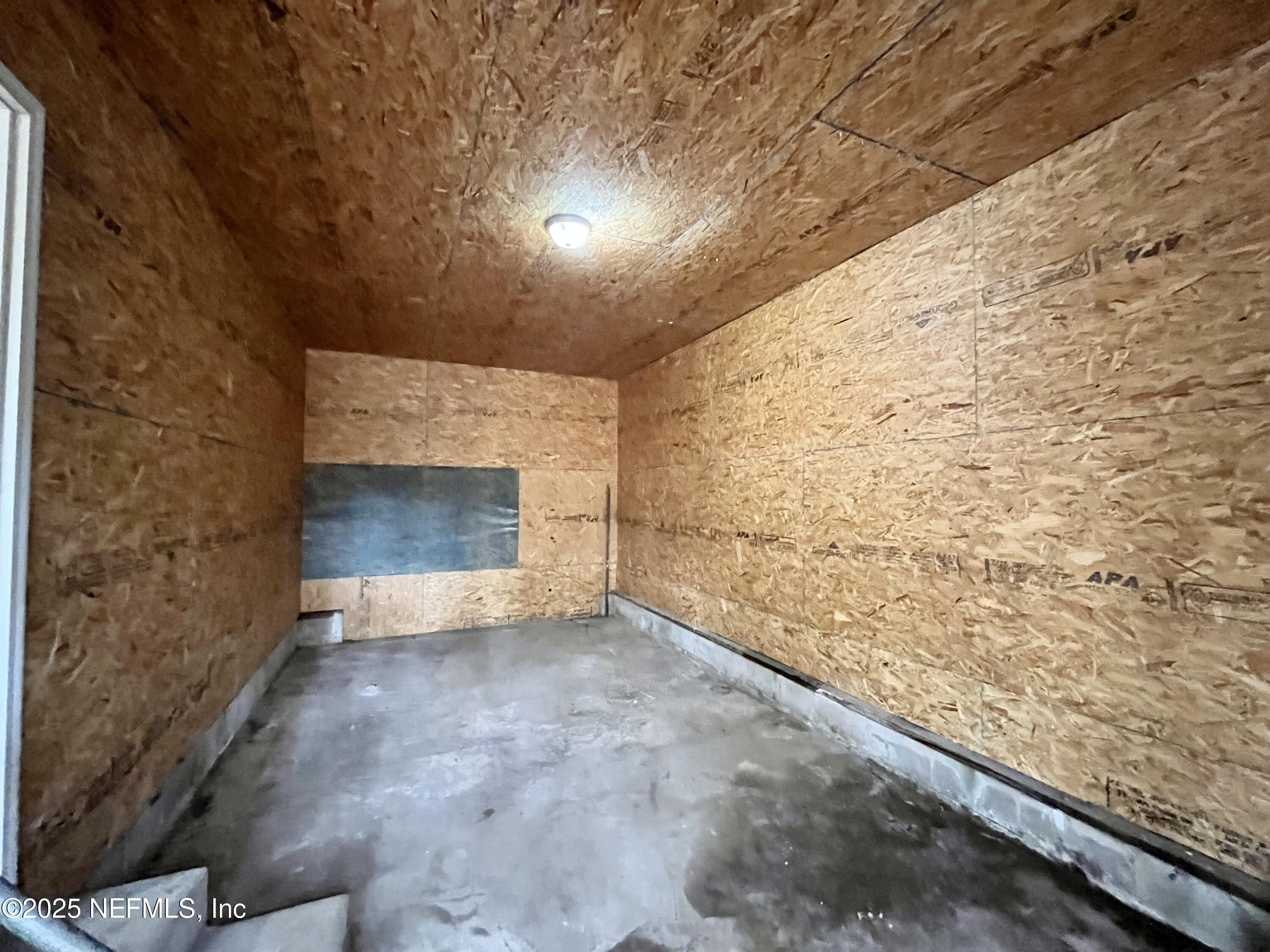 7013 1st Street St. Augustine, FL 32092 - Photo 16 of 16 Large workshop or storage room