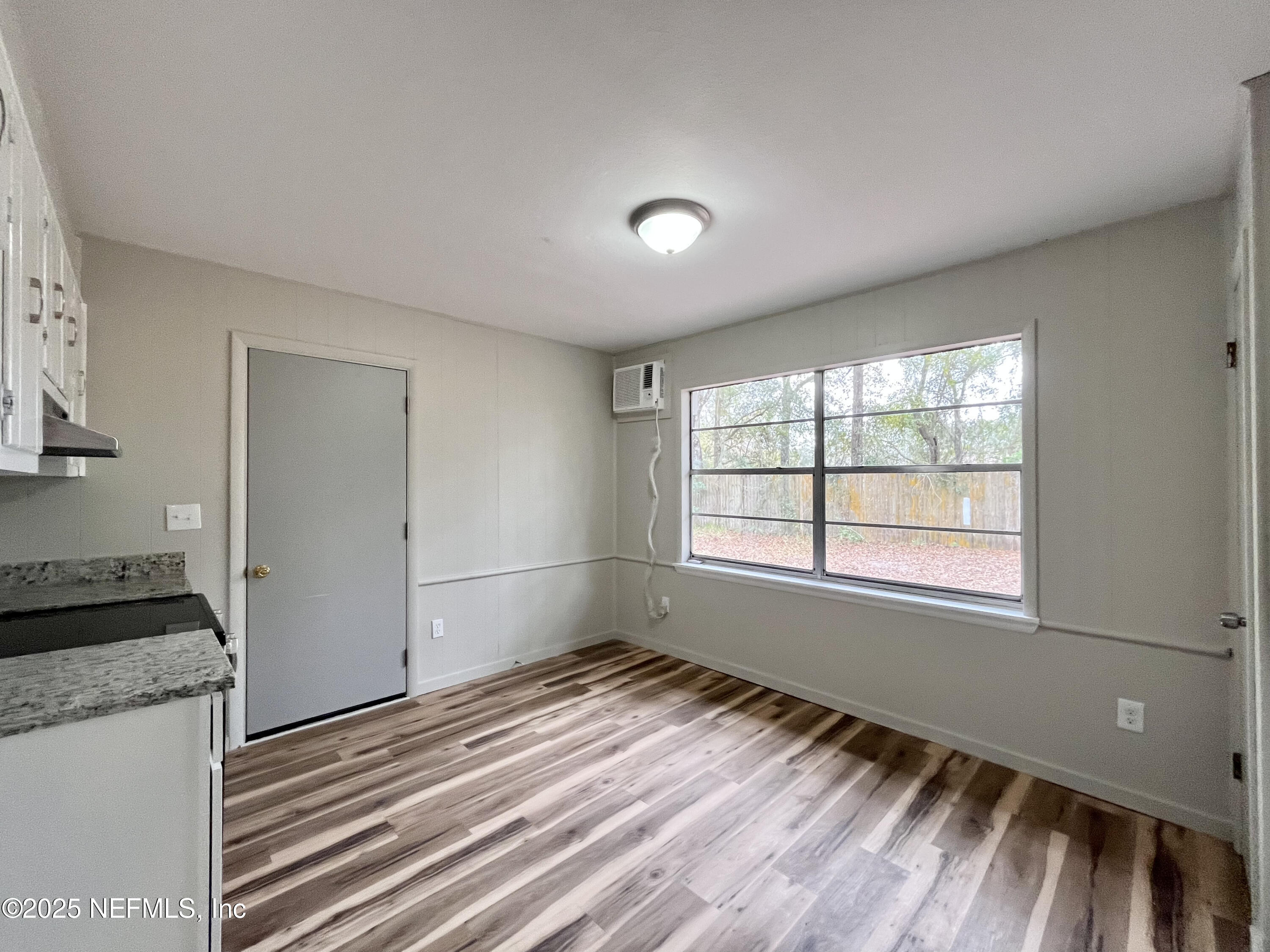 7013 1st Street St. Augustine, FL 32092 - Photo 6 of 16 Kitchen with door to storage or workshop