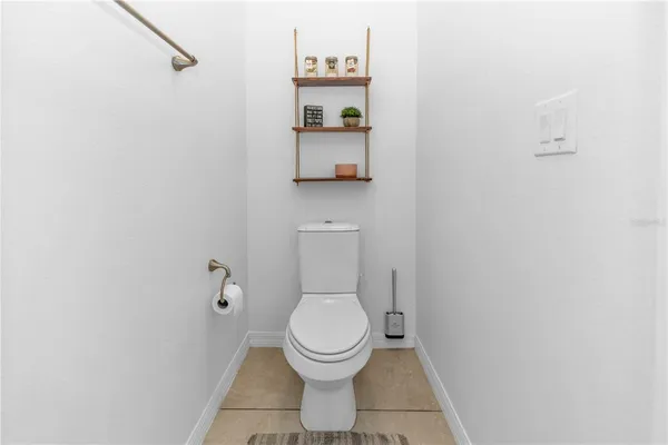 a bathroom with a toilet and a sink