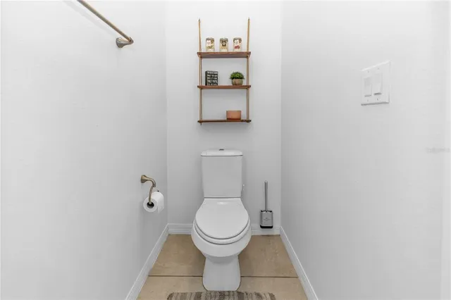 a bathroom with a toilet and a sink