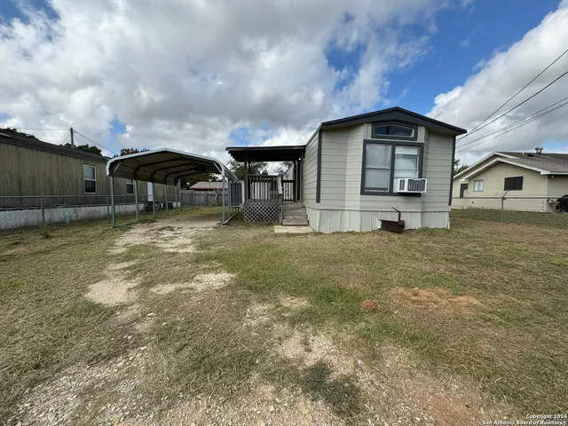 a front view of house with yard