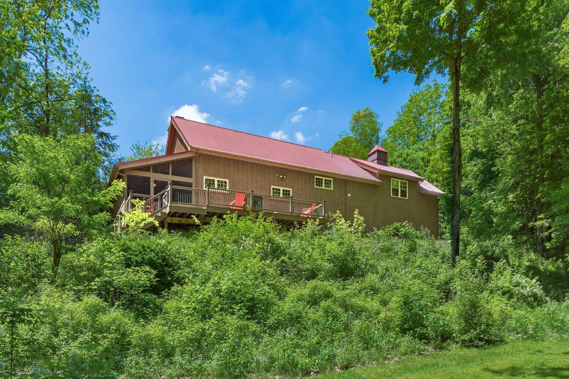 11444 Hazel Dell Road Howard, OH 43028 - Photo 5 of 41 Set on top of the hill overlooking the surrounding natural paradise.