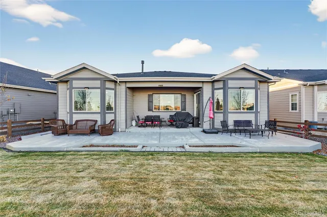 a view of swimming pool with outdoor seating