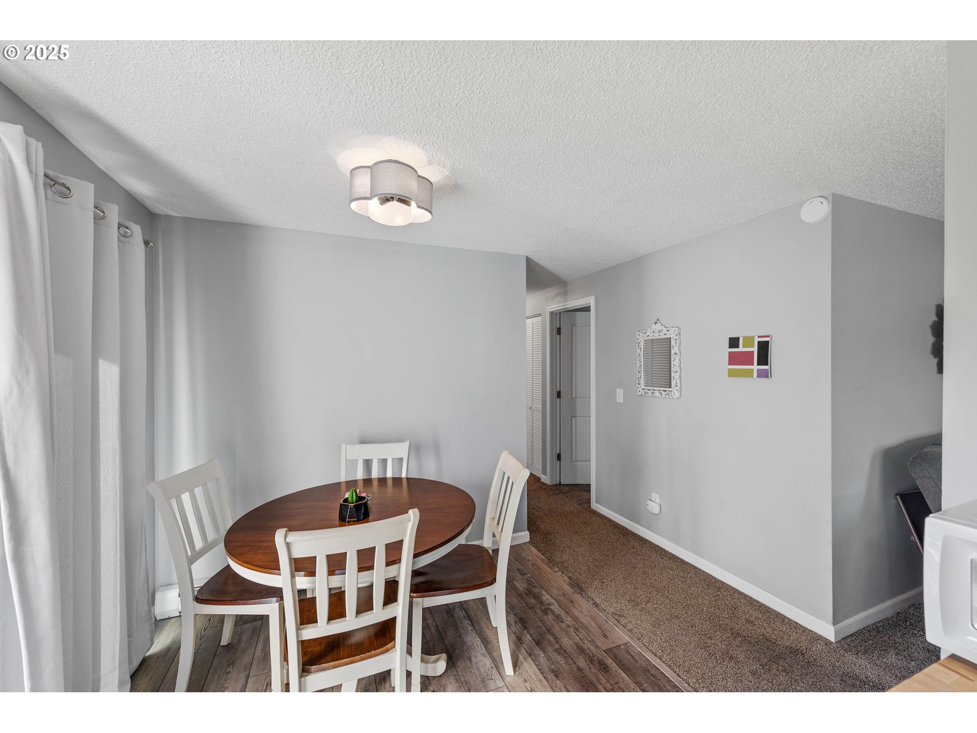 124 Holly Court Reedsport, OR 97467 - Photo 11 of 30 a dining room with furniture and wooden floor