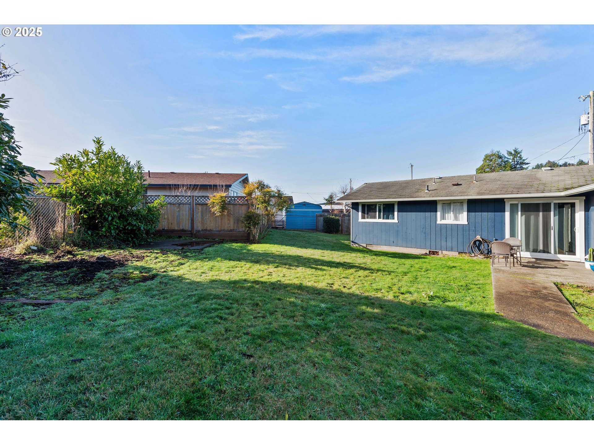 124 Holly Court Reedsport, OR 97467 - Photo 25 of 30 a view of a house with a backyard