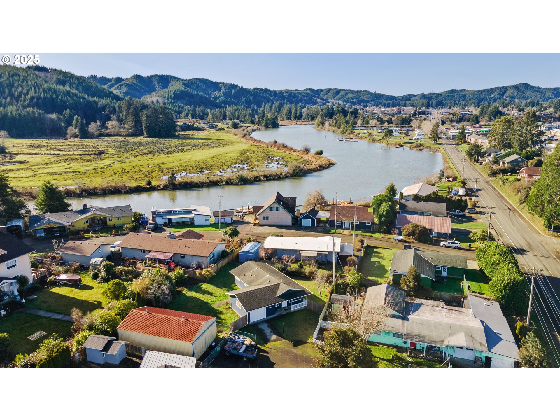 124 Holly Court Reedsport, OR 97467 - Photo 3 of 30 a picture of city view with lake view and mountain view