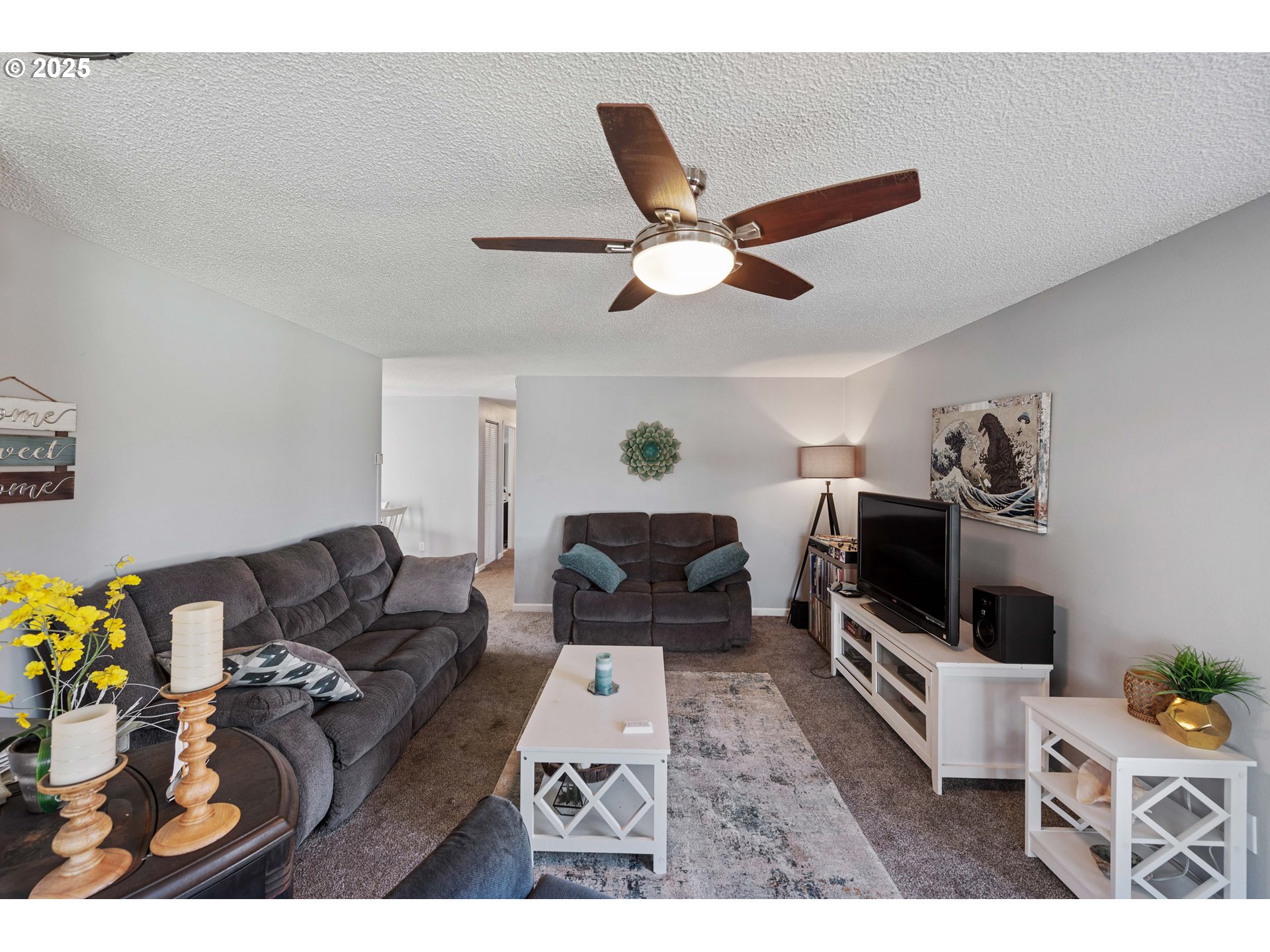 124 Holly Court Reedsport, OR 97467 - Photo 5 of 30 a living room with furniture and a flat screen tv