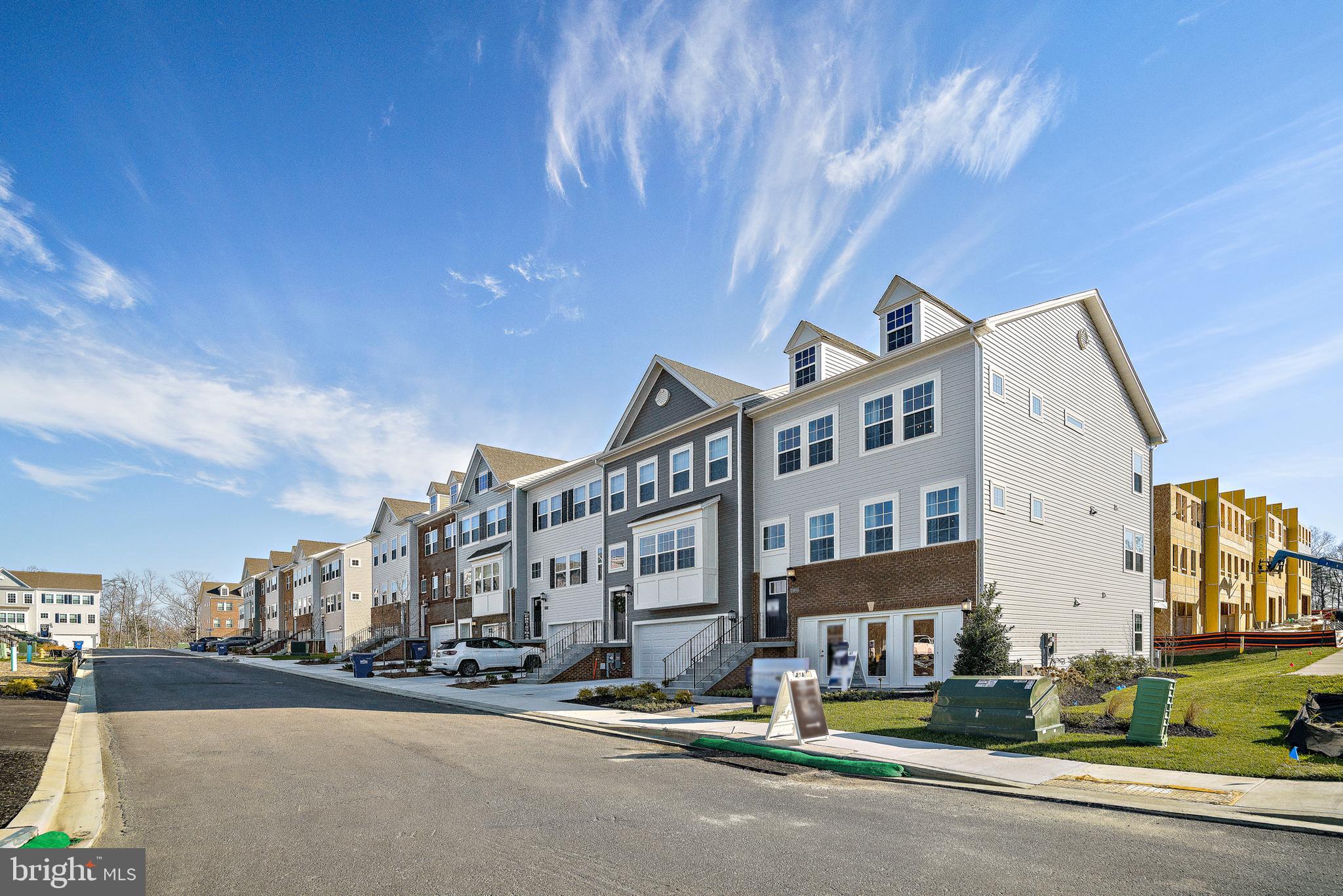 23600 Crosswinds Way California, MD 20619 - Photo 2 of 55 a city street lined with buildings and trees
