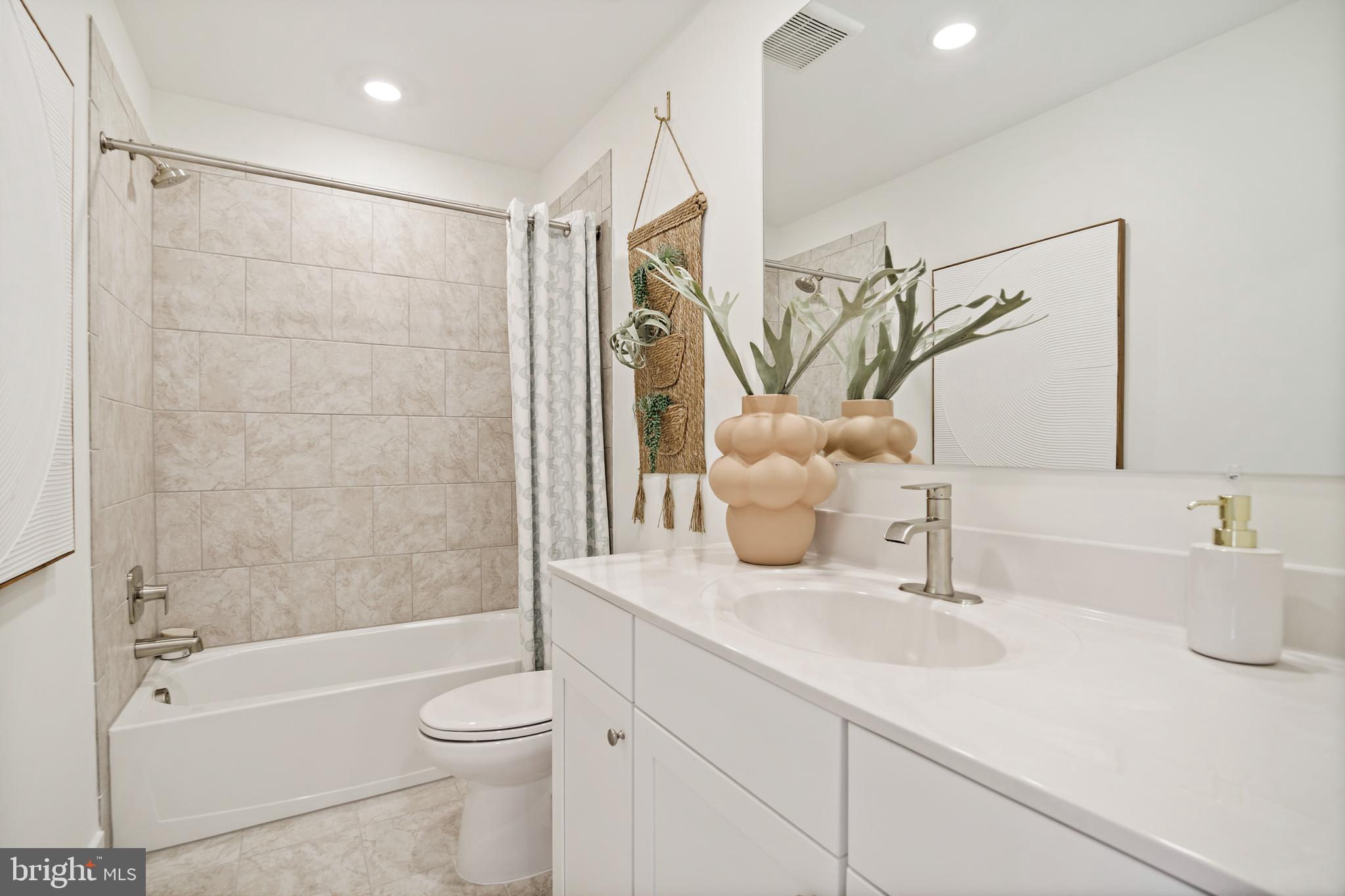23600 Crosswinds Way California, MD 20619 - Photo 26 of 55 a bathroom with a sink a toilet and a bathtub