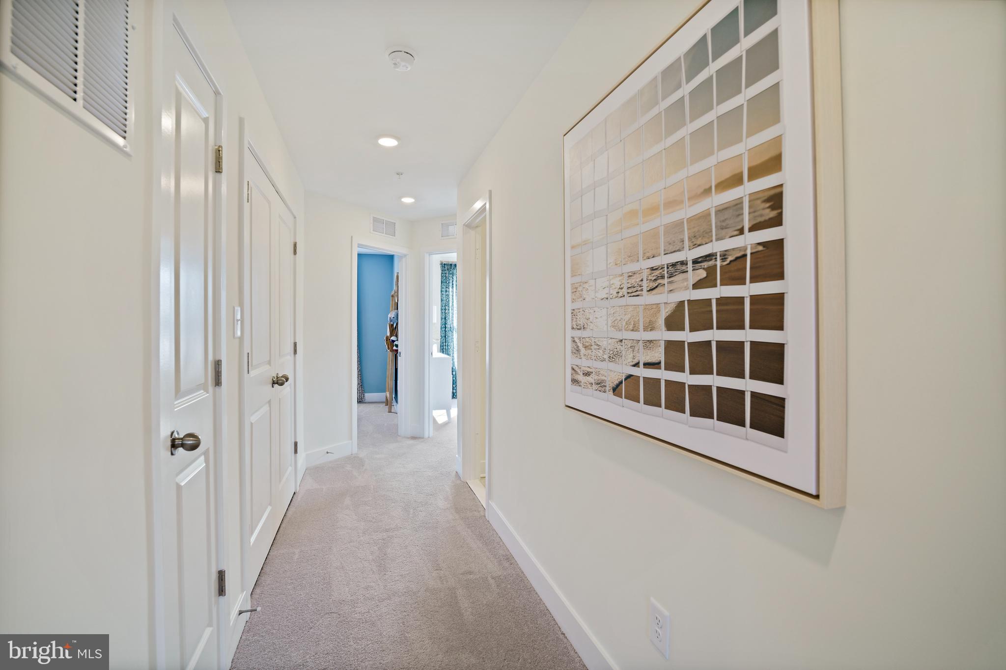 23600 Crosswinds Way California, MD 20619 - Photo 30 of 55 a view of a hallway with windows