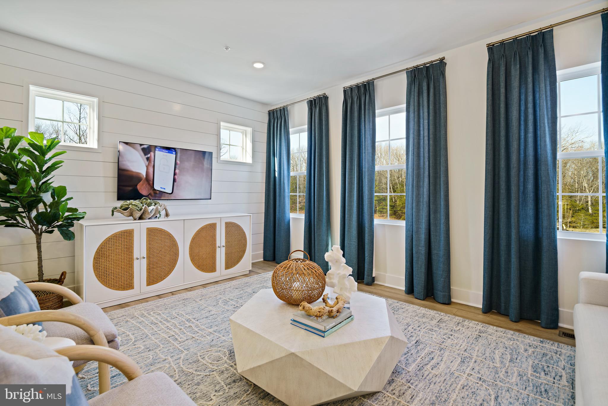 23600 Crosswinds Way California, MD 20619 - Photo 3 of 55 a living room with furniture and a mirror